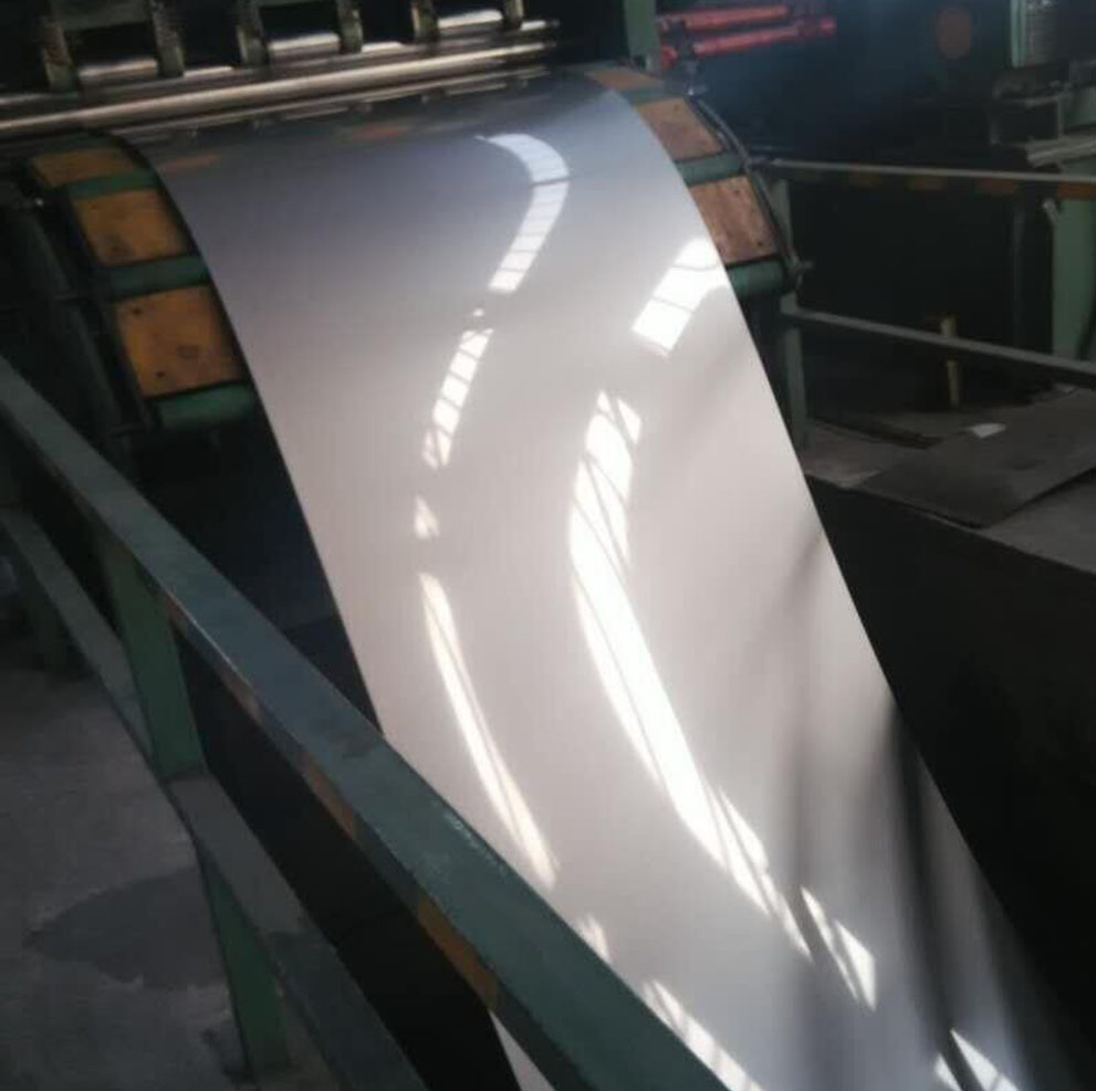 Industrial stainless steel coil and sheet material handling